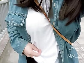 Asian woman expose her tits on poblic