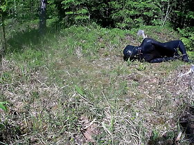 Outdoor hogtie in hot summer day.