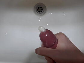 Cumming into Condom in Bathroom