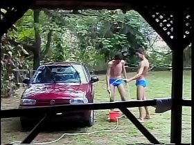 Young curly tutti frutti Wellington helps his neighbour to find the problem with spark plug fouling of his car